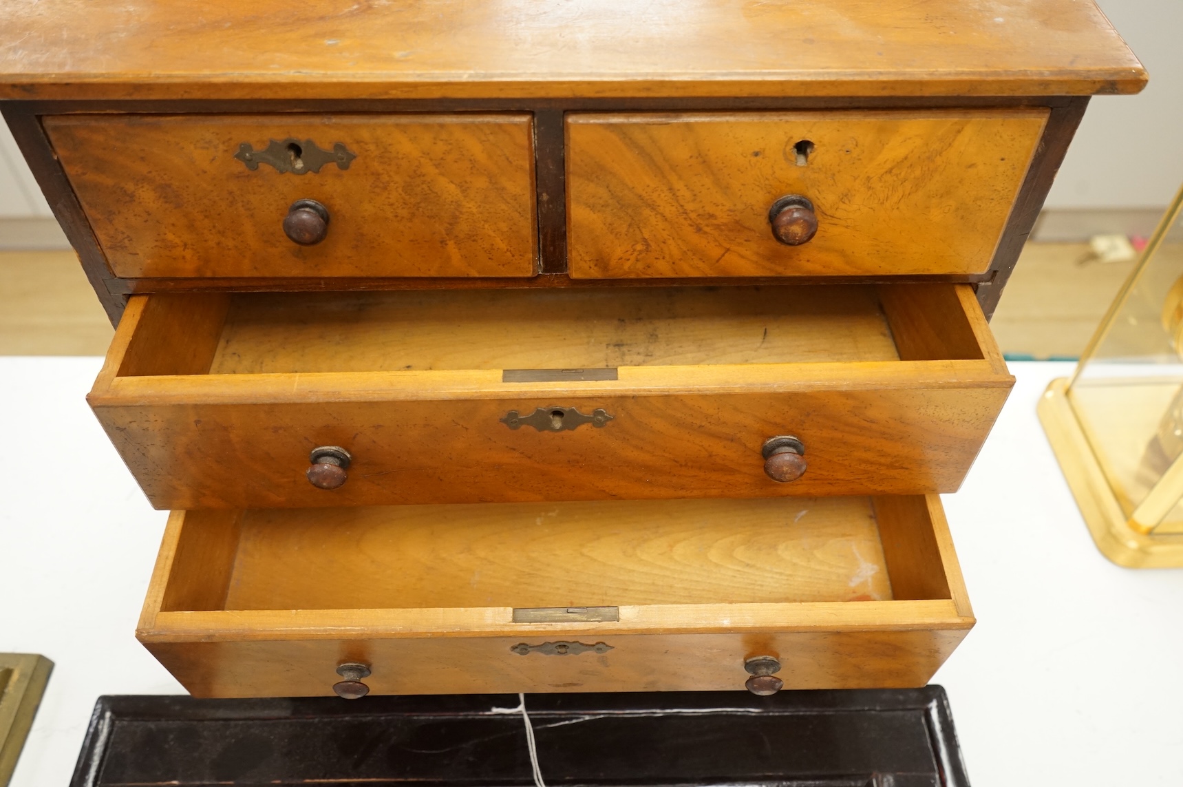A Victorian walnut table-top chest with five drawers, 39cm high